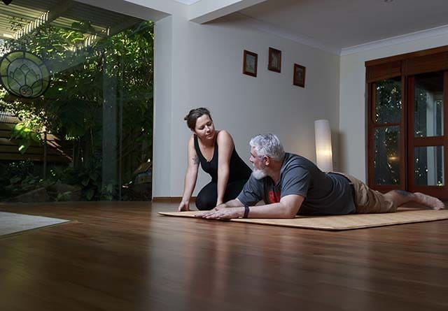 Lisa running an online yoga therapy session