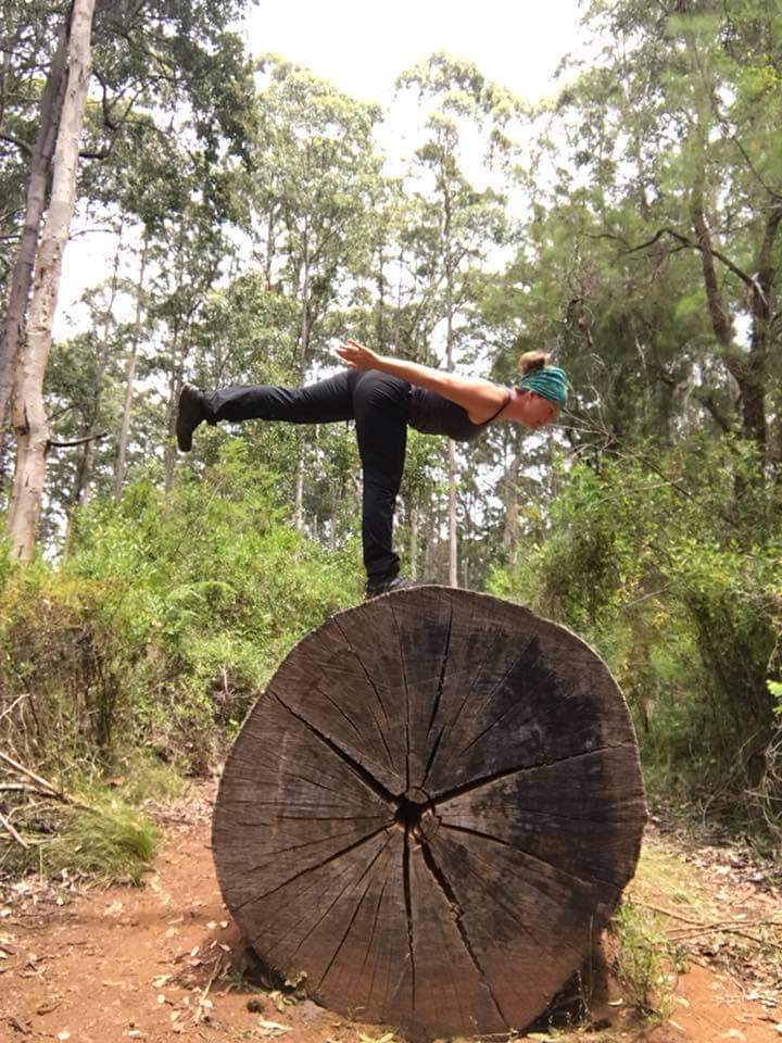 Lisa in Warrior3 Pose whilst hiking in Western Australia.