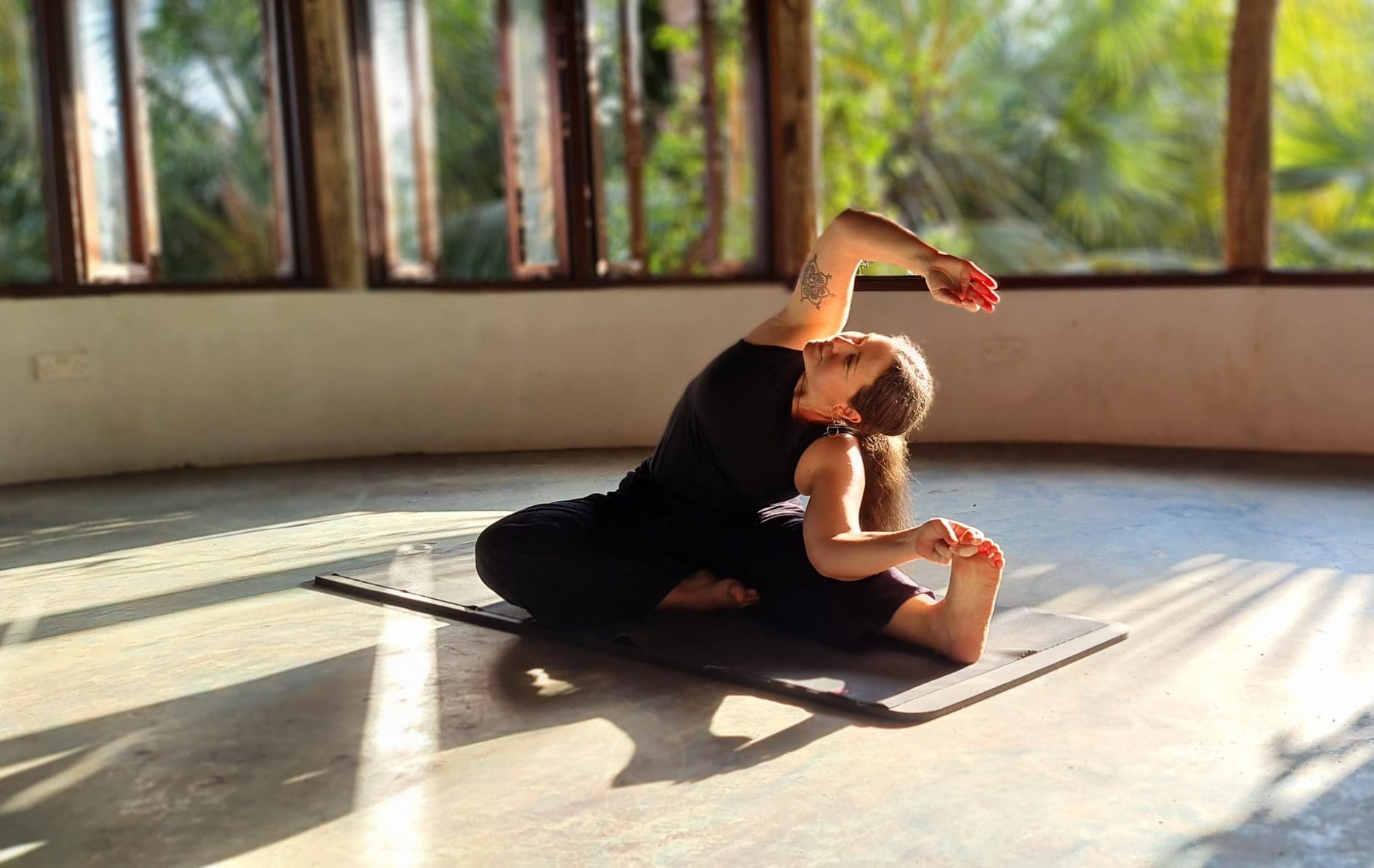 Lisa practicing yoga